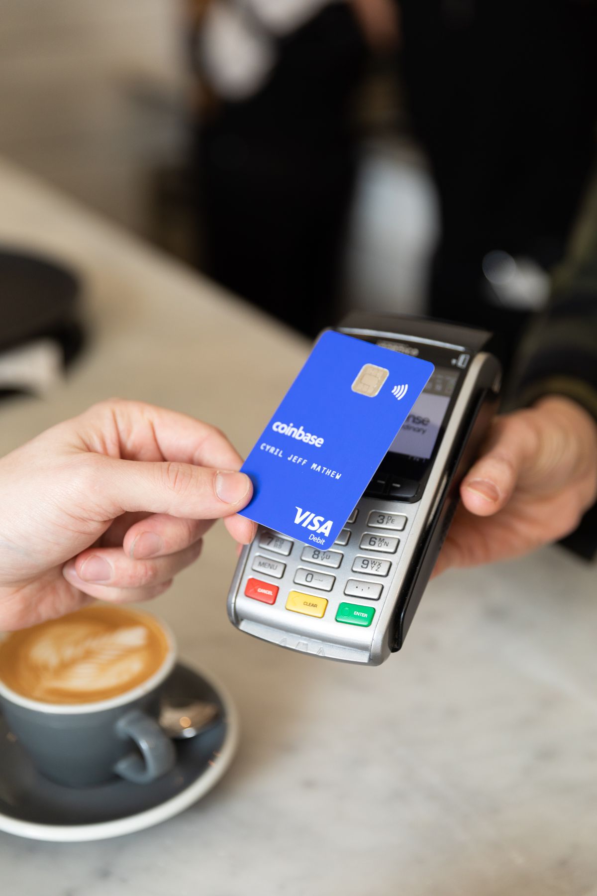Coinbase launches crypto Visa debit card in the UK, rest ...