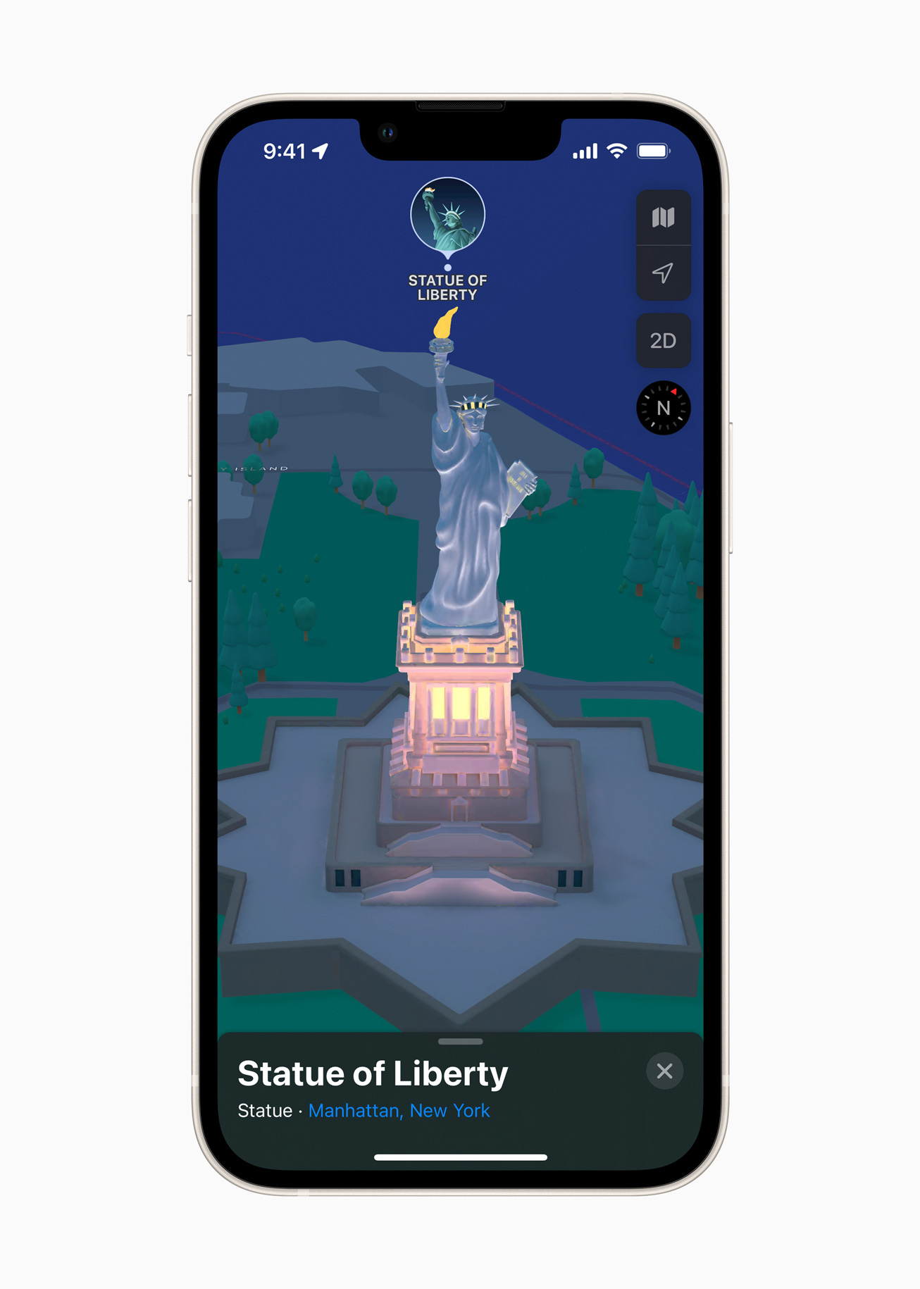 The Statue of Liberty glows at night on the maps app.