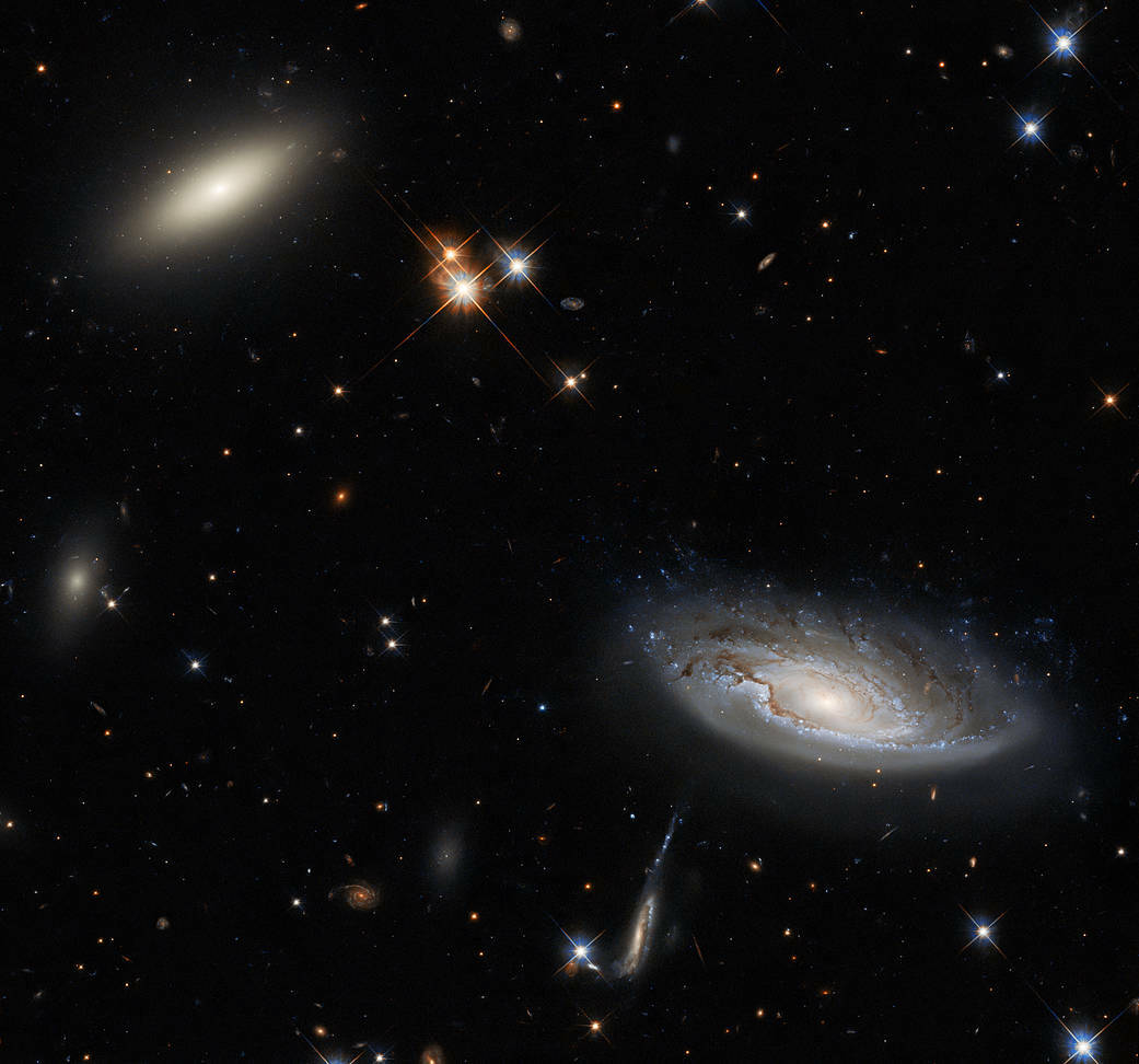 Two galaxies 350 million light-years from Earth are seen in this gorgeous shot.